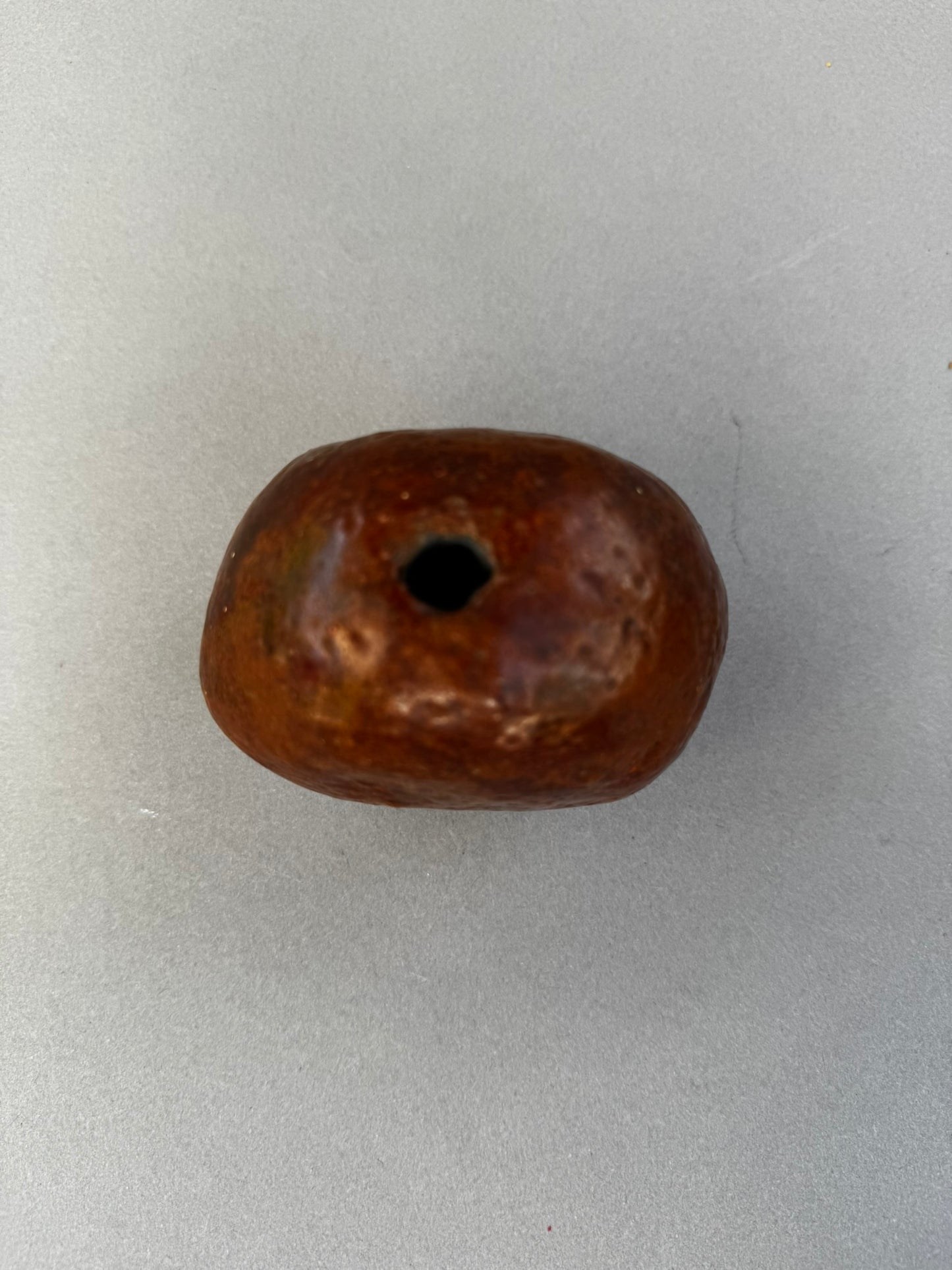 Primitive Handcrafted Clay Bead – Ethnic Red-Brown Ceramic Artifact with Pierced Center