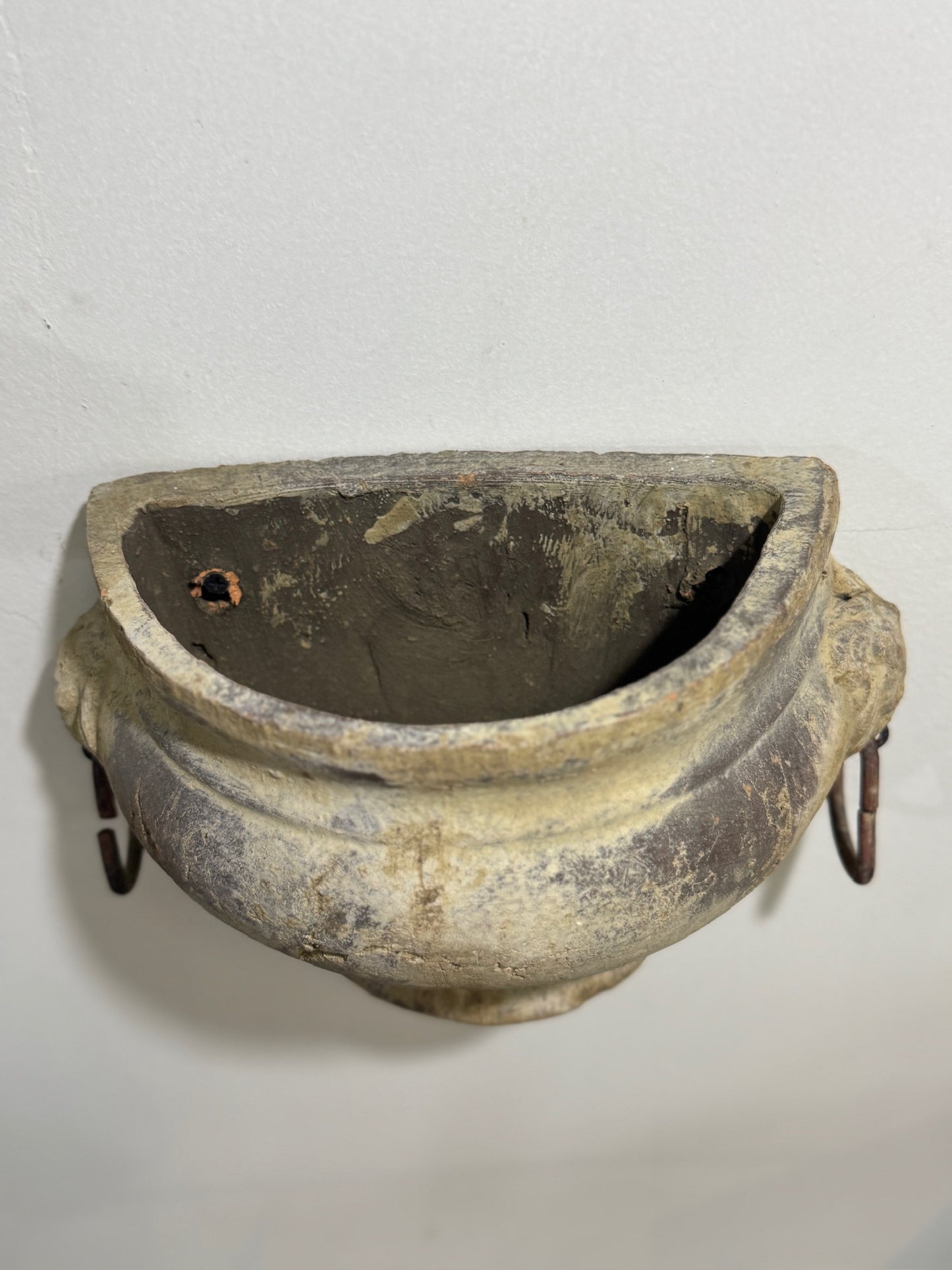 Pair of Aged Mediterranean-Style Wall Planters with Iron Ring Handles – Rustic Half-Moon Pottery Vessels