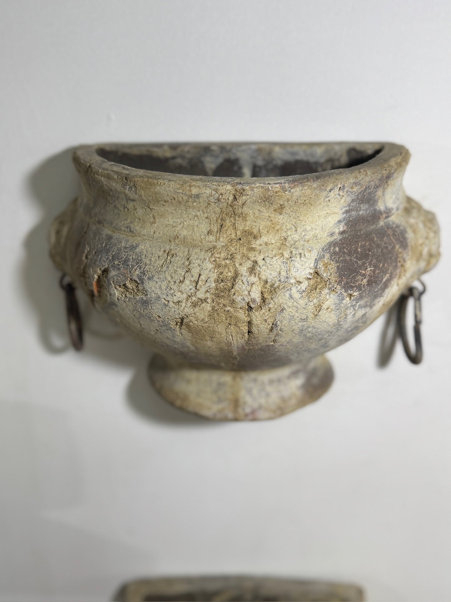 Pair of Aged Mediterranean-Style Wall Planters with Iron Ring Handles – Rustic Half-Moon Pottery Vessels