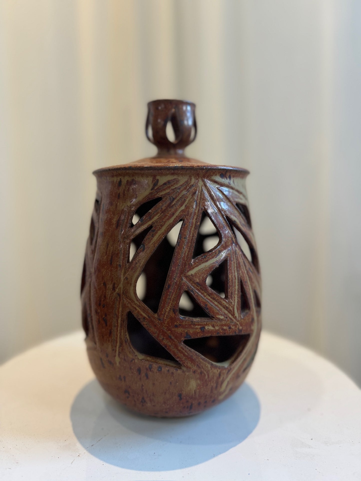 Vintage Ceramic Vase with Lid and Geometric Cutout Design