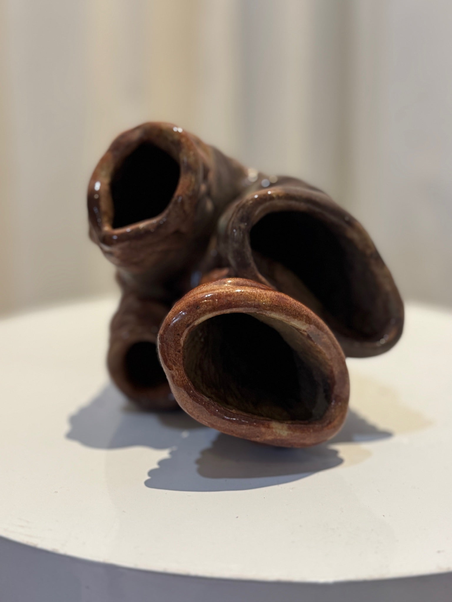 Abstract clay swirl sculptural vase, handcrafted with earthy glaze and flowing form, unique collectible blending organic and contemporary design — Hommes and Gardens, Vases + Vessels Collection, Landscape Architect, Interior Designer, Outdoor Living, Art, Furniture, Objects, Best Gifts, Nature, Backyard, Yard, Outdoor Decorations, Home Decor, Home Design, Luxury Design.