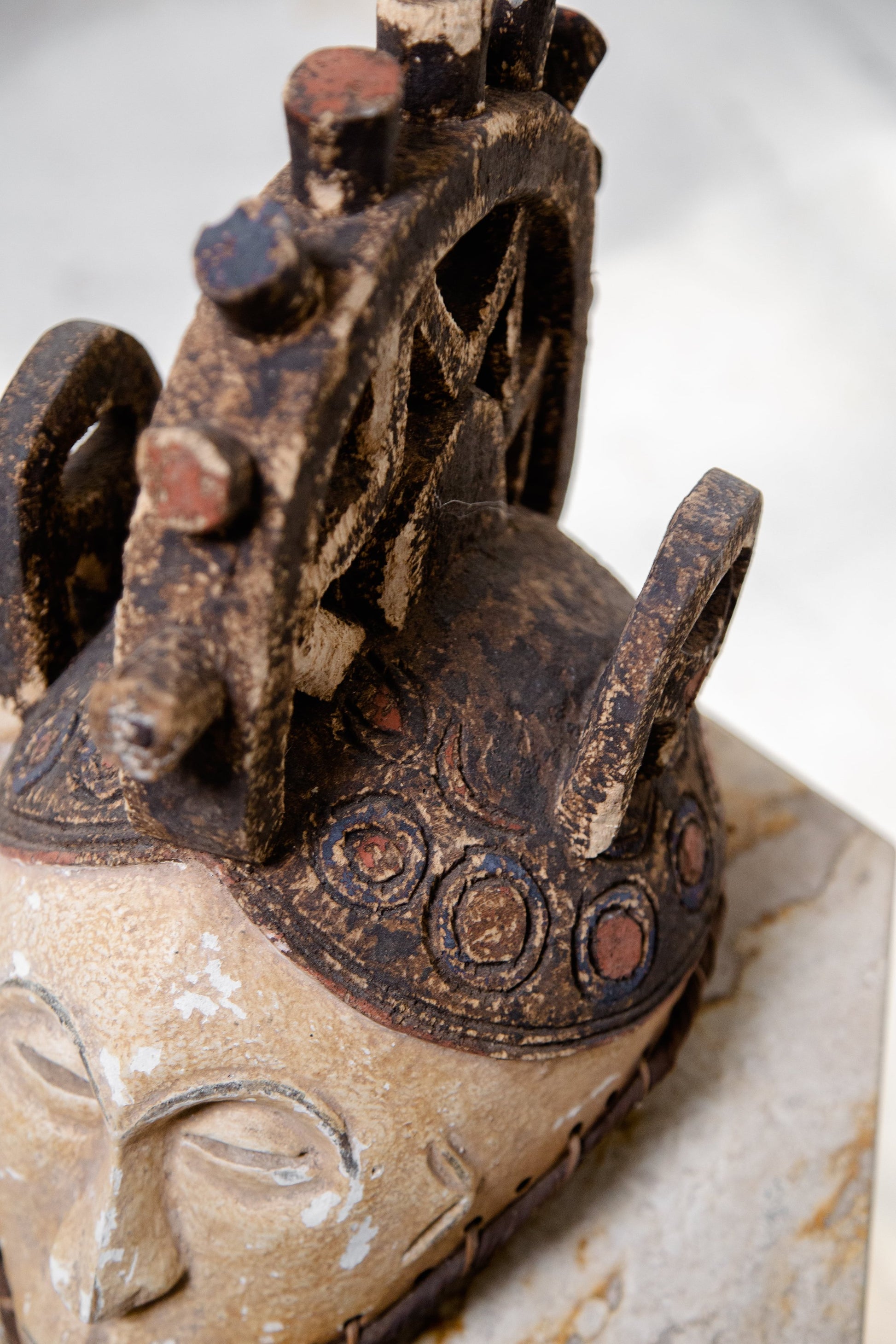 African Igbo mask from the 19th century, made of wood, paint, and dyed fabric, a genuine antique artifact of Nigerian art — Hommes and Gardens, Objects Collection, home decor, outdoor decorations, home design, luxury design, Landscape Architect, Interior Designer, Outdoor Living, Art, Furniture, Objects, Best Gifts, Nature, Backyard, Yard.