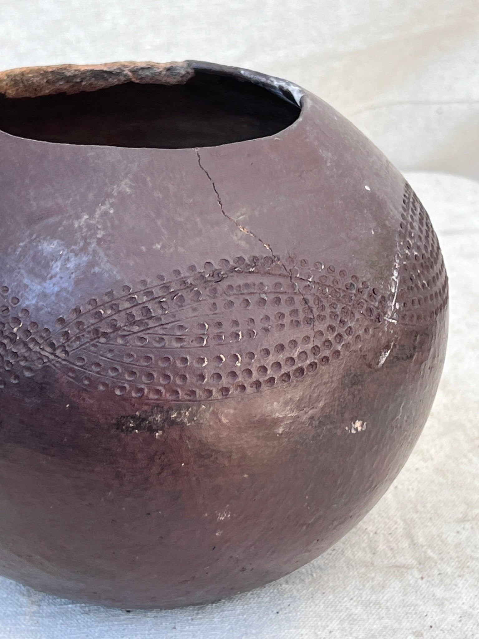 Antique South African Zulu beer pot handcrafted from clay, showcasing traditional incised designs and cultural heritage — Hommes and Gardens, home decor, outdoor decorations, home design, luxury design, Landscape Architect, Interior Designer, Outdoor Living, Art, Furniture, Objects, Best Gifts, Nature, Backyard, Yard.