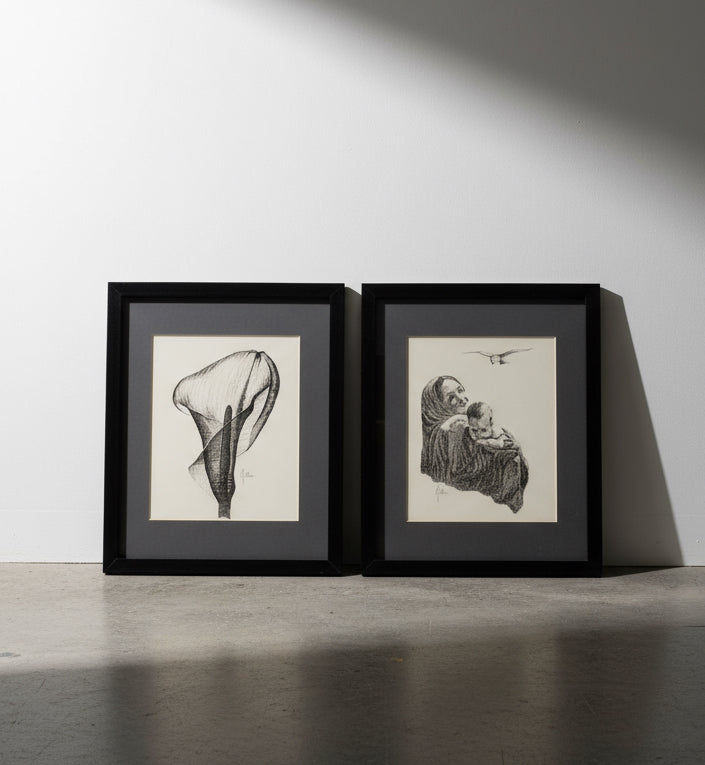 Black and white vintage framed wall art set of two, including a graceful calla lily and tender mother-and-child image — Hommes and Gardens, Wallscape Collection, Wall Art, Vintage Decor, Framed Prints, Monochrome Artwork, Home Styling, Artistic Wall Decor.