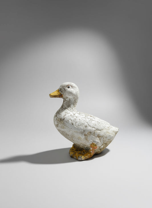 Weathered vintage concrete duck garden sculpture with rustic folk art charm and aged patina — Hommes and Gardens, Home Decor Collection, landscape design, plant design, Landscape Architect, Interior Designer, Outdoor Living, Outdoor Decorations, Home Design, Luxury Design, Art, Furniture, Objects, Best Gifts, Nature, Backyard, Yard.