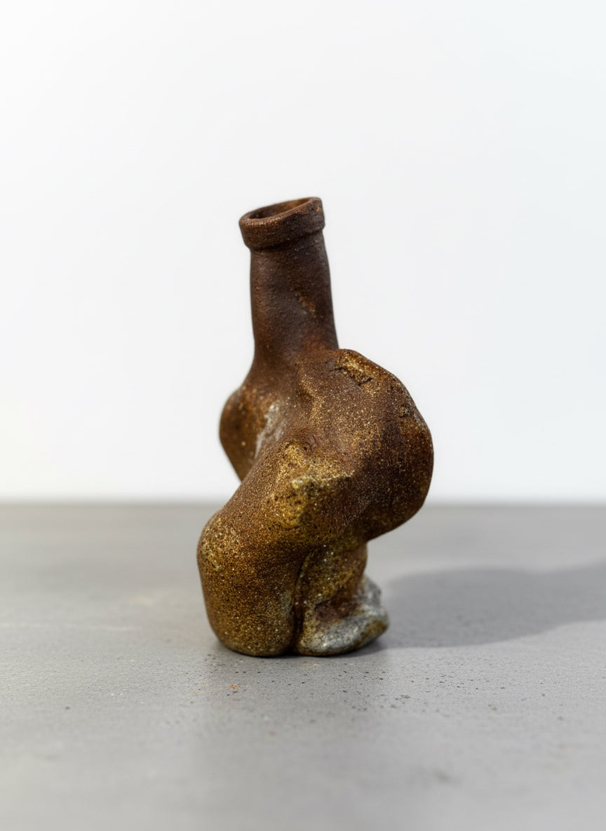 Detailed view of freeform studio pottery vase with abstract modernist organic shape and earthy stoneware glaze — Hommes and Gardens, Home Decor Collection, landscape design, plant design, Landscape Architect, Interior Designer, Outdoor Living, Outdoor Decorations, Home Design, Luxury Design, Art, Furniture, Objects, Best Gifts, Nature, Backyard, Yard.