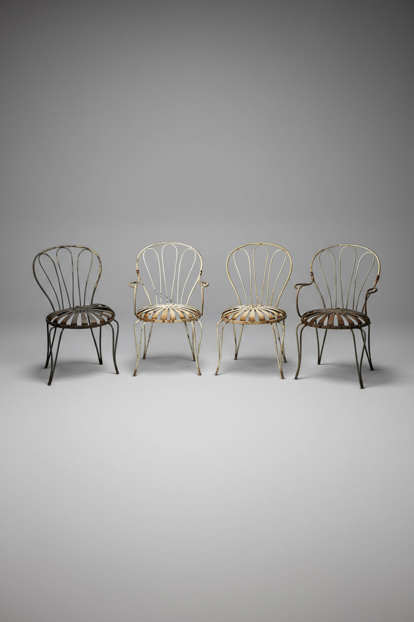 French vintage François Carré garden furniture set featuring intricate wrought iron chairs and matching table, elegant and collectible outdoor decor — Hommes and Gardens, Furniture Collection, Outdoor Furniture Sets, Vintage Garden Art, French Patio Furniture, Iron Craftsmanship, Restoration Piece, Designer Outdoor Set.
