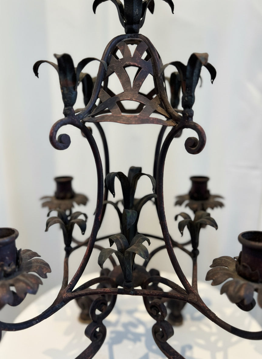 Antique French wrought iron candelabra with four arms and ornate leaf detailing, Gothic floral motifs, and aged iron finish, a fine decorative candle holder — Hommes and Gardens, Home Decor Collection, Candles, Antiques, Decorative Objects, landscape design, plant design, Landscape Architect, Interior Designer, Outdoor Living, Outdoor Decorations, Home Design, Luxury Design, Art, Furniture, Objects, Best Gifts, Nature, Backyard, Yard.