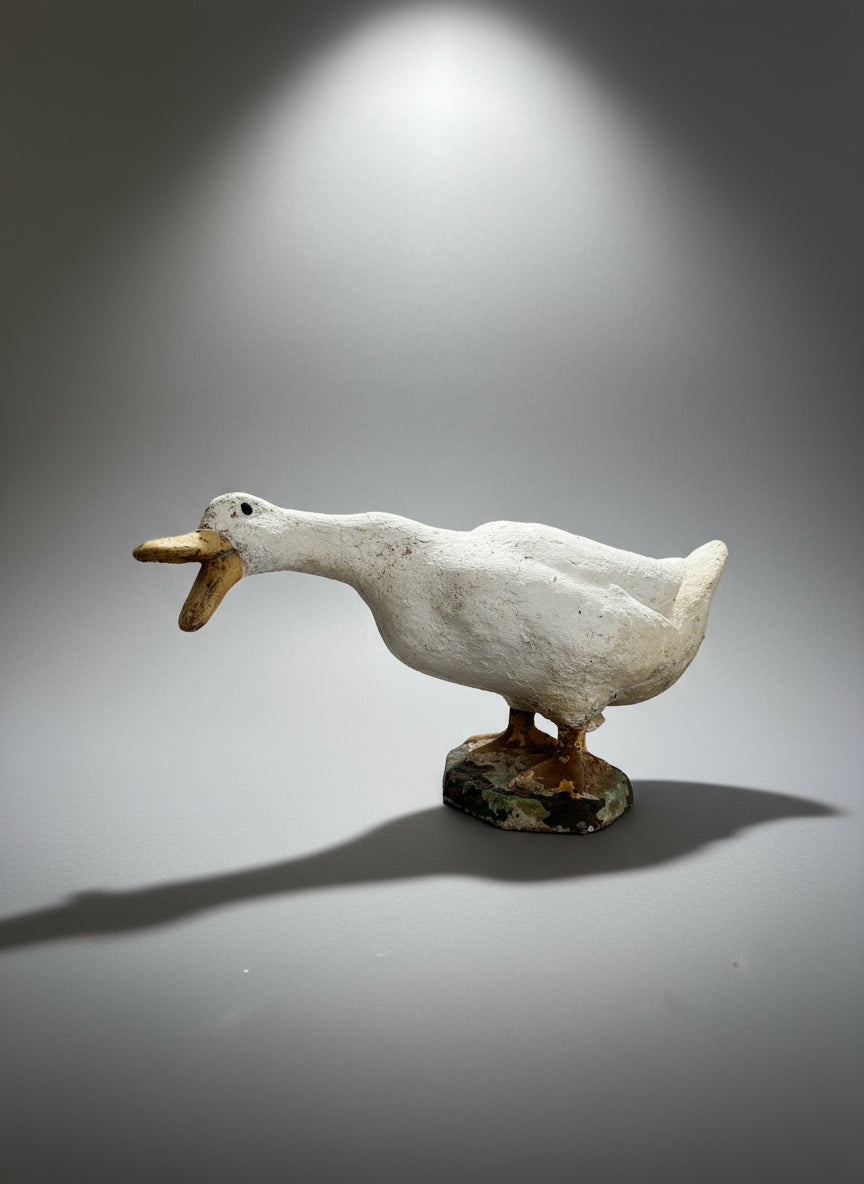Vintage concrete goose doorstop sculpture in a quacking pose with hand-painted details and weathered patina — Hommes and Gardens, Home Decor Collection, landscape design, plant design, Landscape Architect, Interior Designer, Outdoor Living, Outdoor Decorations, Home Design, Luxury Design, Art, Furniture, Objects, Best Gifts, Nature, Backyard, Yard.