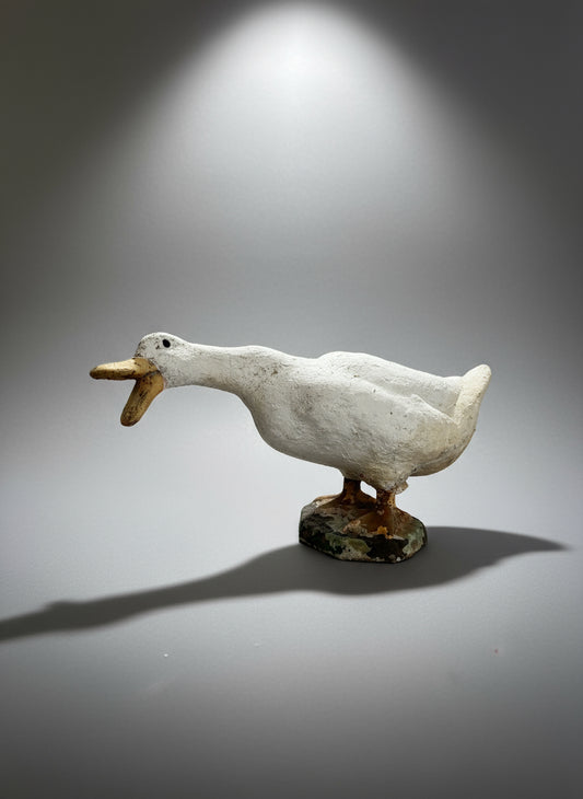 Vintage concrete goose doorstop sculpture in a quacking pose with hand-painted details and weathered patina — Hommes and Gardens, Home Decor Collection, landscape design, plant design, Landscape Architect, Interior Designer, Outdoor Living, Outdoor Decorations, Home Design, Luxury Design, Art, Furniture, Objects, Best Gifts, Nature, Backyard, Yard.