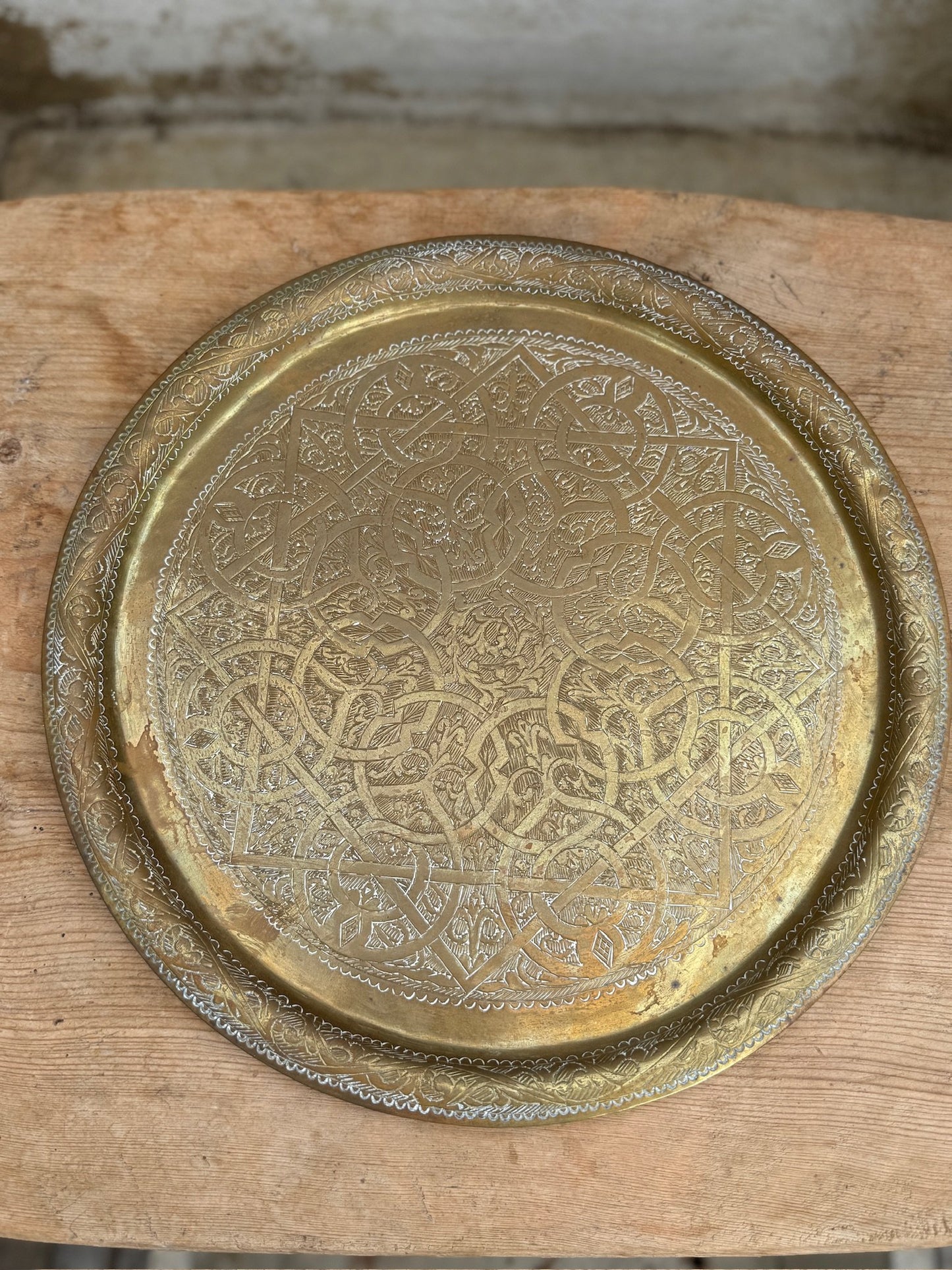 Hand-engraved brass Indo-Persian round tray from the 20th century, detailed with ornamental patterns ideal for luxury home décor — Hommes and Gardens, Objects Collection, Landscape Architect, Interior Designer, Outdoor Living, Art, Furniture, Objects, Best Gifts, Nature, Backyard, Yard, Outdoor Decorations, Home Decor, Home Design, Luxury Design.