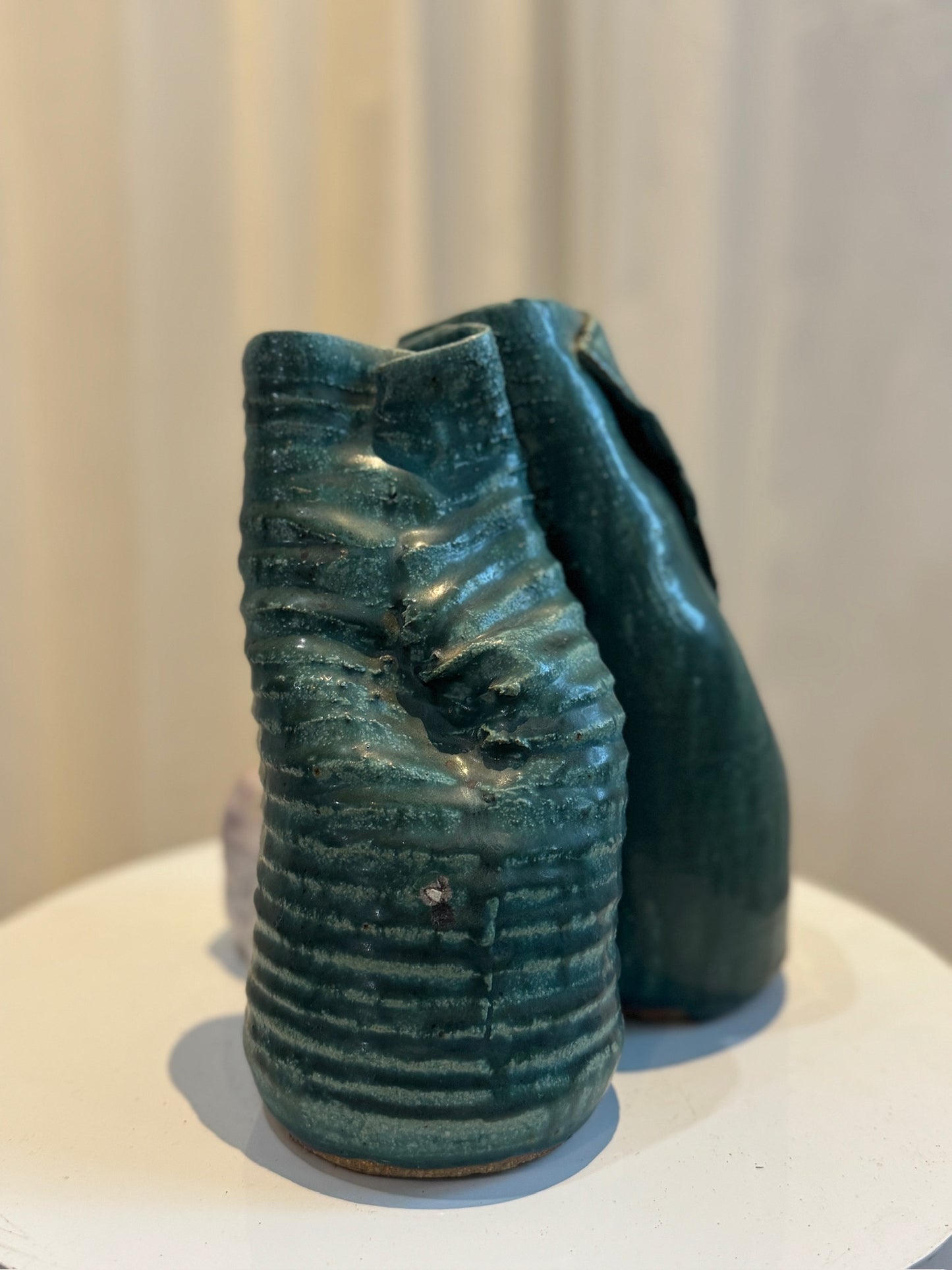 Handcrafted ceramic abstract sculpture combining green-glazed vessels with off-white cracked section, dynamic textural design and modern artistry — Hommes and Gardens, Pots + Planters Collection, Landscape Architect, Interior Designer, Outdoor Living, Art, Furniture, Objects, Best Gifts, Nature, Backyard, Yard, Outdoor Decorations, Home Decor, Home Design, Luxury Design.