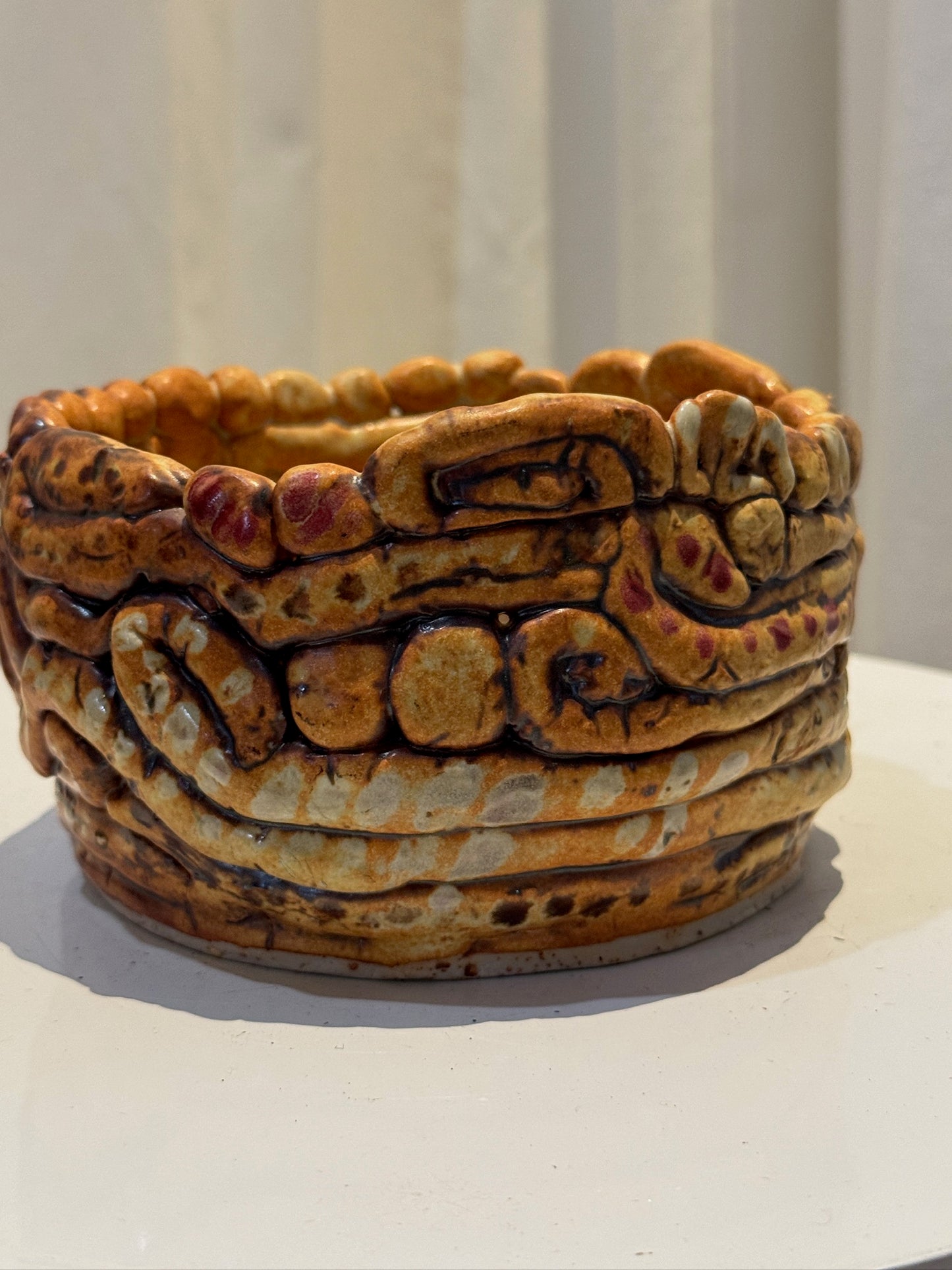 Handcrafted clay swirly coiled ceramic vessel featuring an earthy glaze of brown, amber, and burgundy tones, sculptural artisan pottery ideal for organic modern interiors — Hommes and Gardens, Vases Collection, Landscape Architect, Interior Designer, Outdoor Living, Art, Furniture, Objects, Best Gifts, Nature, Backyard, Yard, Outdoor Decorations, Home Decor, Home Design, Luxury Design.