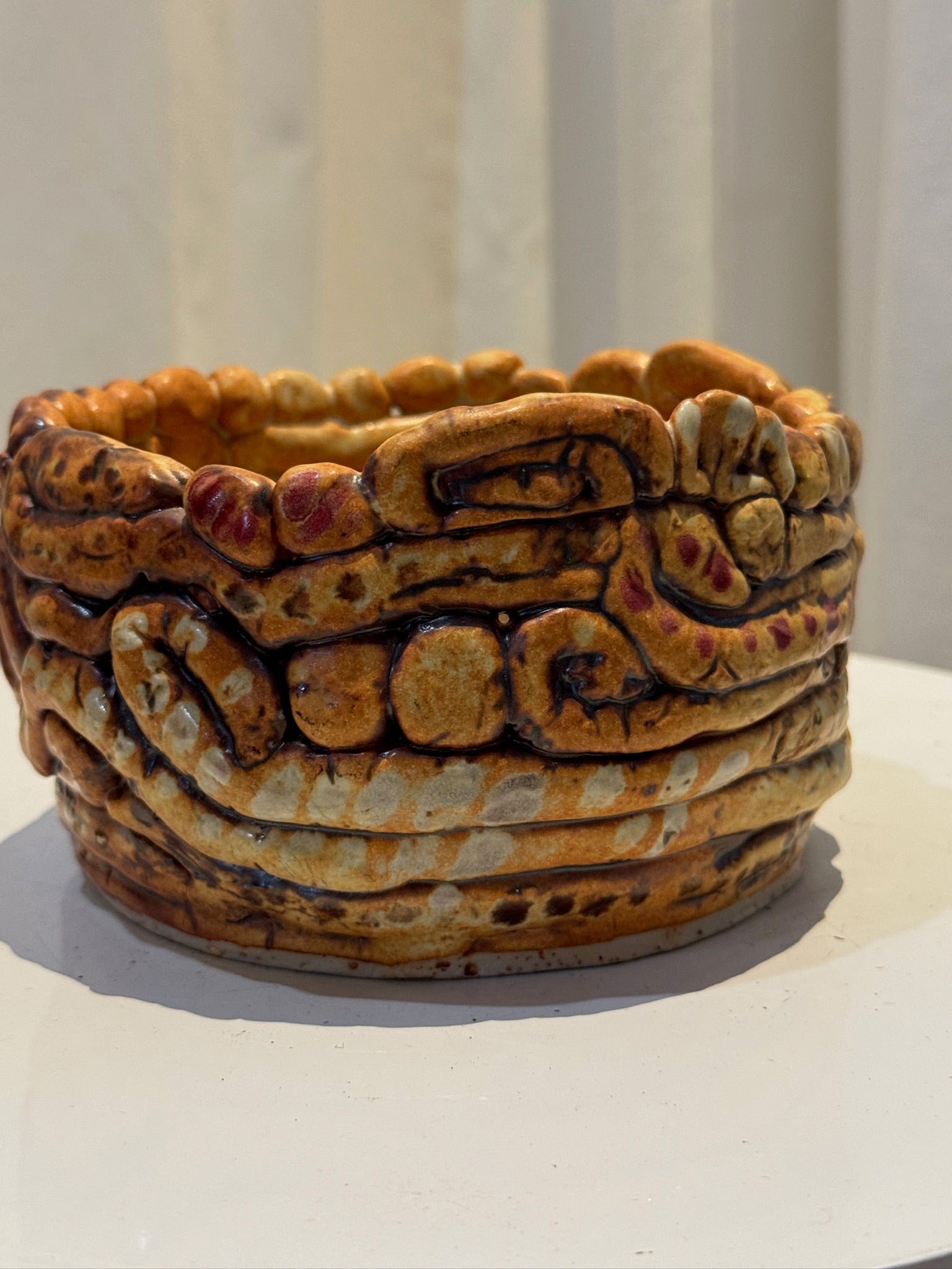 Handcrafted clay swirly coiled ceramic vessel featuring an earthy glaze of brown, amber, and burgundy tones, sculptural artisan pottery ideal for organic modern interiors — Hommes and Gardens, Vases Collection, Landscape Architect, Interior Designer, Outdoor Living, Art, Furniture, Objects, Best Gifts, Nature, Backyard, Yard, Outdoor Decorations, Home Decor, Home Design, Luxury Design.