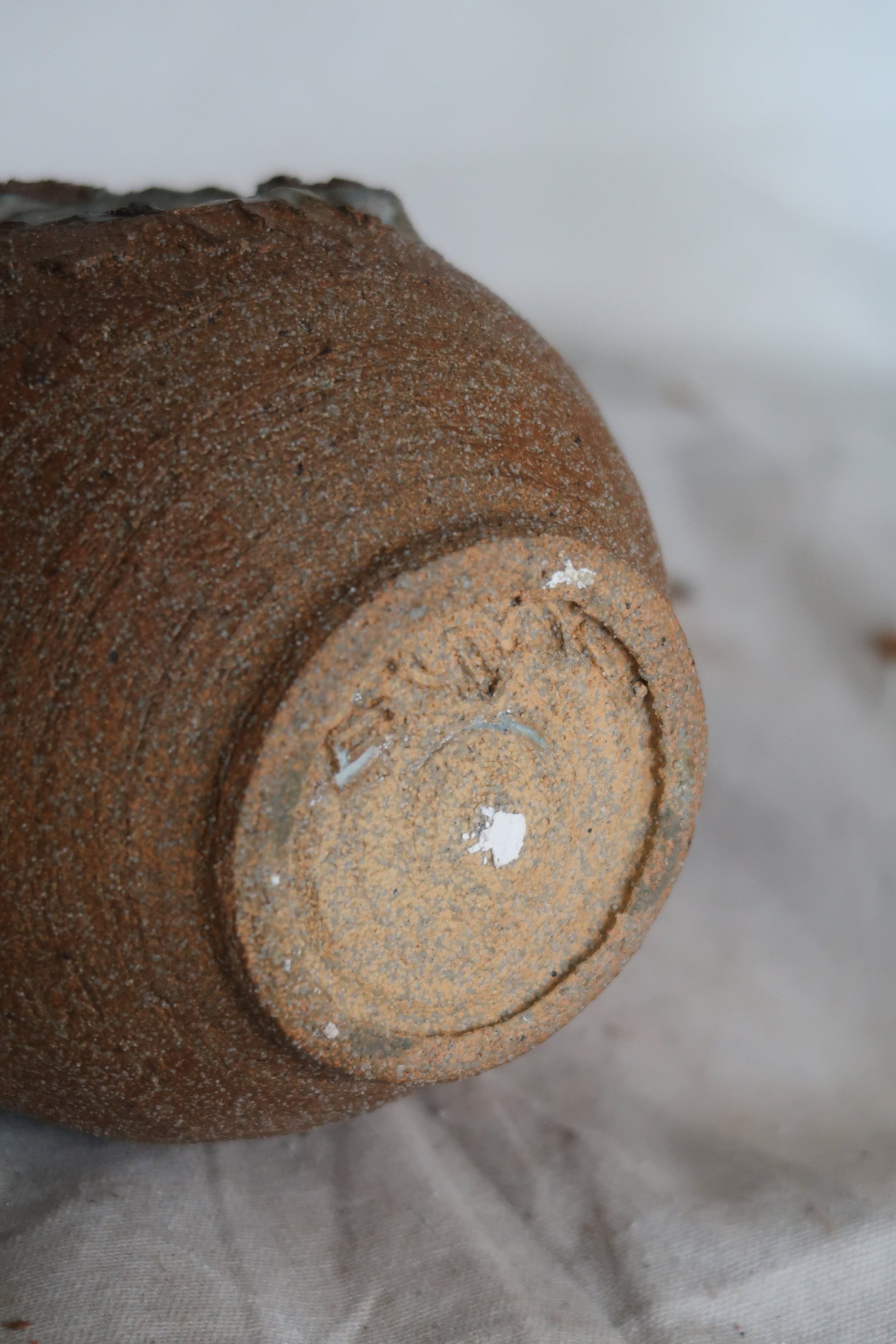 Handcrafted mid-century stoneware vase with Brutalist form and signature detailing, textured ceramic artistry — Hommes and Gardens, Pots + Vessels Collection, Home Decor, Modern Pottery, Vintage Art, Ceramic Decor, Designer Interiors.