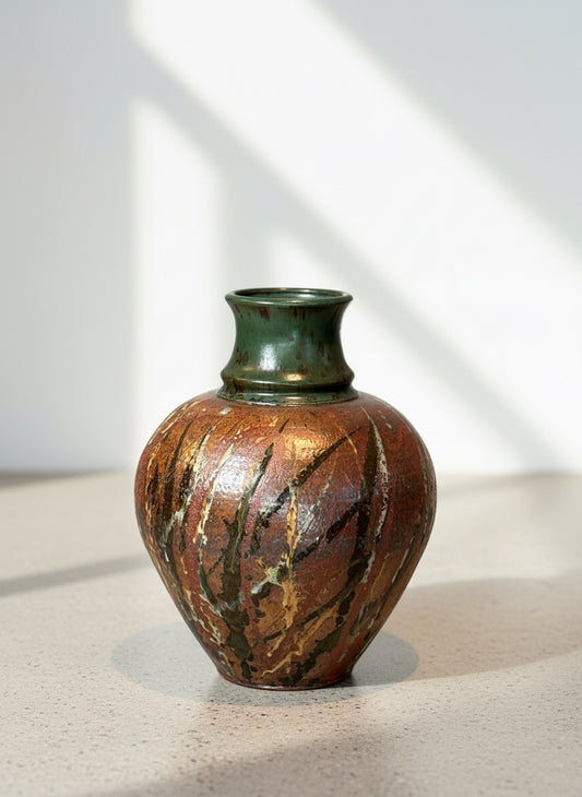 Signed handcrafted stoneware vase with rich earthy glaze in brown, rust, and green tones, showcasing organic painterly design, front view — Hommes and Gardens, Home Decor Collection, landscape design, plant design, Landscape Architect, Interior Designer, Outdoor Living, Outdoor Decorations, Home Design, Luxury Design, Art, Furniture, Objects, Best Gifts, Nature, Backyard, Yard.