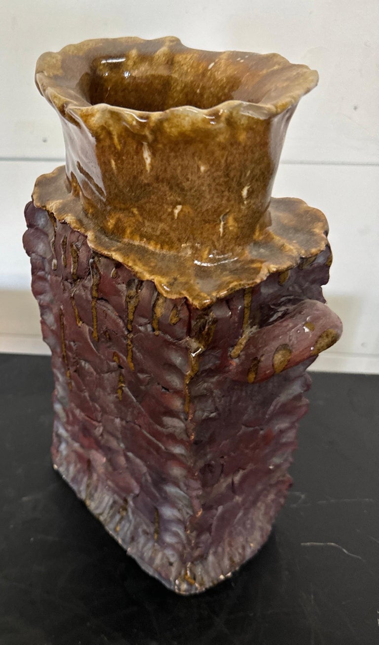 Handcrafted vintage ceramic vase featuring a bold purple body and mustard top, signed square-shaped pottery with artistic flair — Hommes and Gardens, Pots + Vessels Collection, Vases, Vintage Pottery, Artistic Home Decor, Handmade Ceramic Art, Modern Design, Unique Collectible Vase.