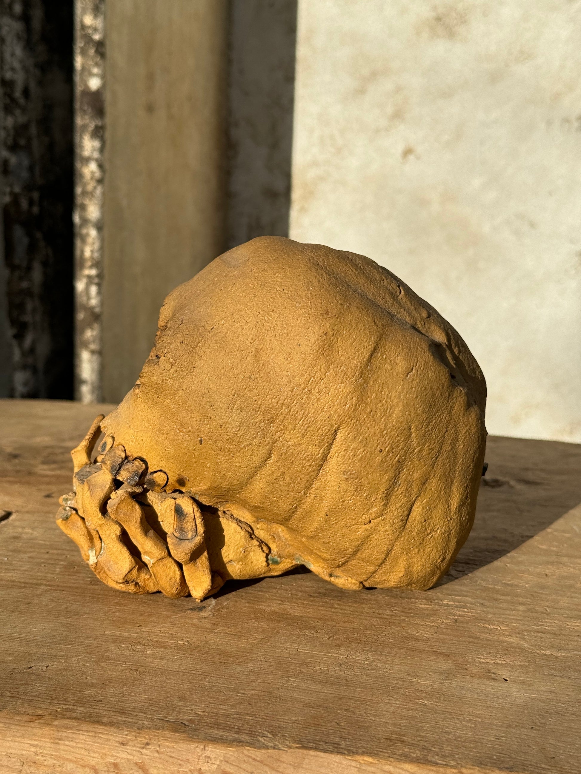 Handmade ceramic skull candle holder showcasing modern artistic design and craftsmanship, a dramatic décor accent — Hommes and Gardens, home decor, outdoor decorations, home design, luxury design, Landscape Architect, Interior Designer, Outdoor Living, Art, Furniture, Objects, Best Gifts, Nature, Backyard, Yard.