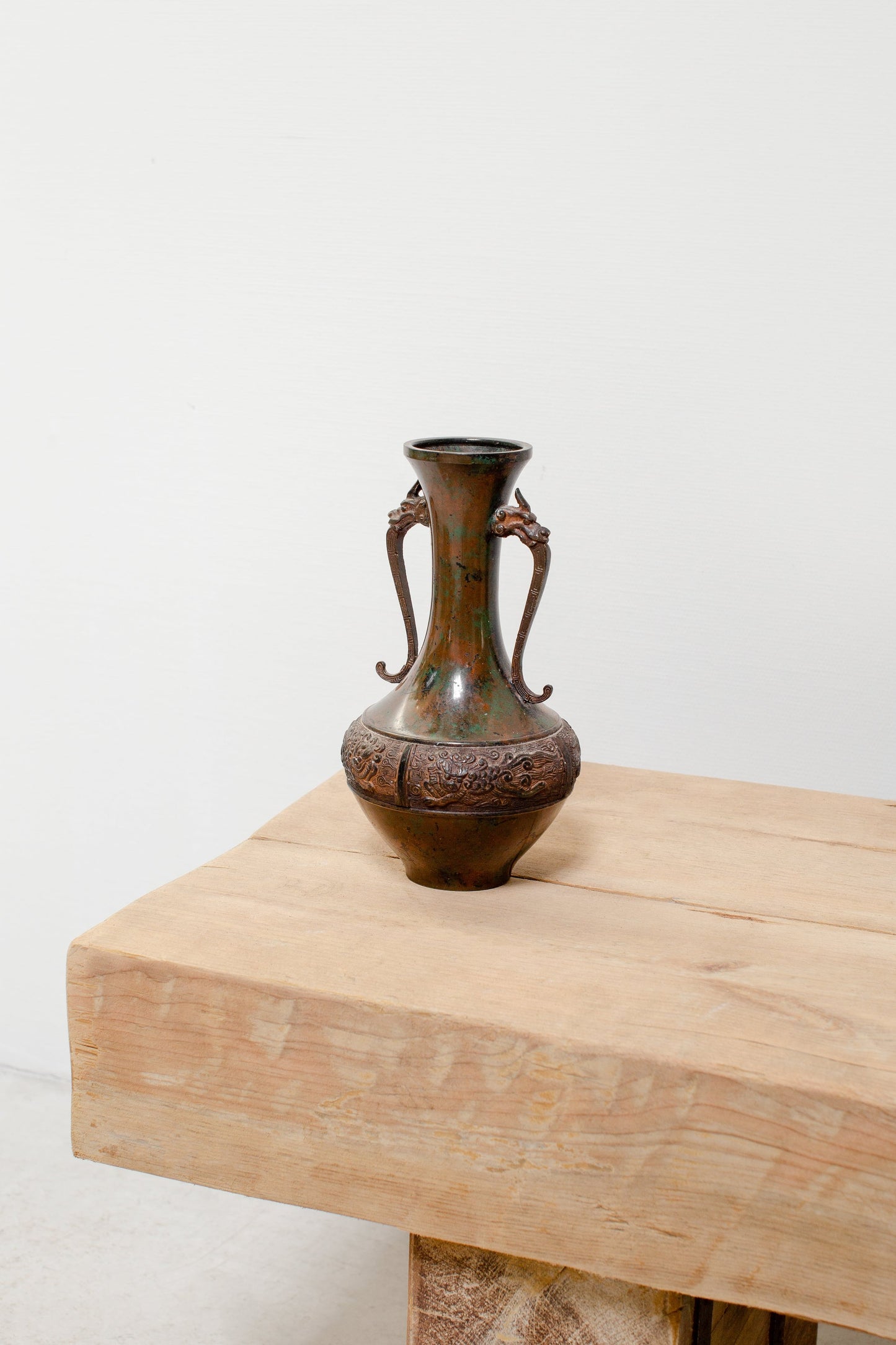 Japanese copper alloy vase with intricate dragon handles and engraved dragon motifs, featuring rich patina and vintage craftsmanship — Hommes and Gardens, Pots + Vessels Collection, Landscape Architect, Interior Designer, Outdoor Living, Outdoor Decorations, Home Decor, Home Design, Luxury Design, Art, Furniture, Objects, Best Gifts, Nature, Backyard, Yard.