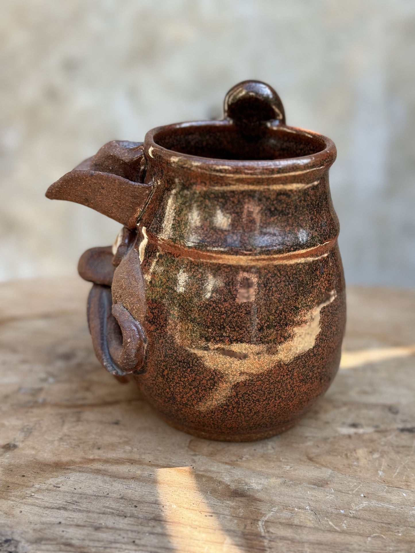 Robert Eakin cowboy face pottery mug with Western design and artist signature, a collectible decorative piece — Hommes and Gardens, Vases + Vessels Collection, home decor, outdoor decorations, home design, luxury design, Landscape Architect, Interior Designer, Outdoor Living, Art, Furniture, Objects, Best Gifts, Nature, Backyard, Yard.
