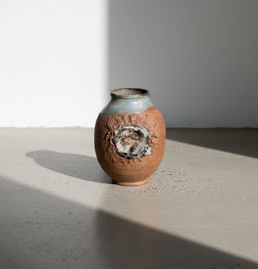 Signed Mid-Century Brutalist stoneware vase showcasing raw textured form and artisan craftsmanship, vintage pottery piece — Hommes and Gardens, Pots + Vessels Collection, Home Decor, Stoneware Art, Brutalist Design, Mid-Century Modern, Collectible Ceramic.
