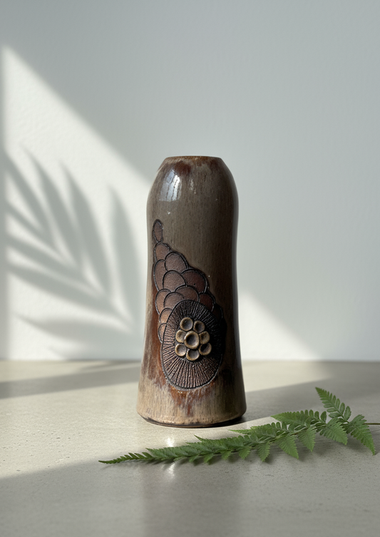 Handcrafted glazed stoneware studio pottery vase with relief floral motif in earthy taupe and brown tones — Hommes and Gardens, Home Decor Collection, landscape design, plant design, Landscape Architect, Interior Designer, Outdoor Living, Outdoor Decorations, Home Design, Luxury Design, Art, Furniture, Objects, Best Gifts, Nature, Backyard, Yard.
