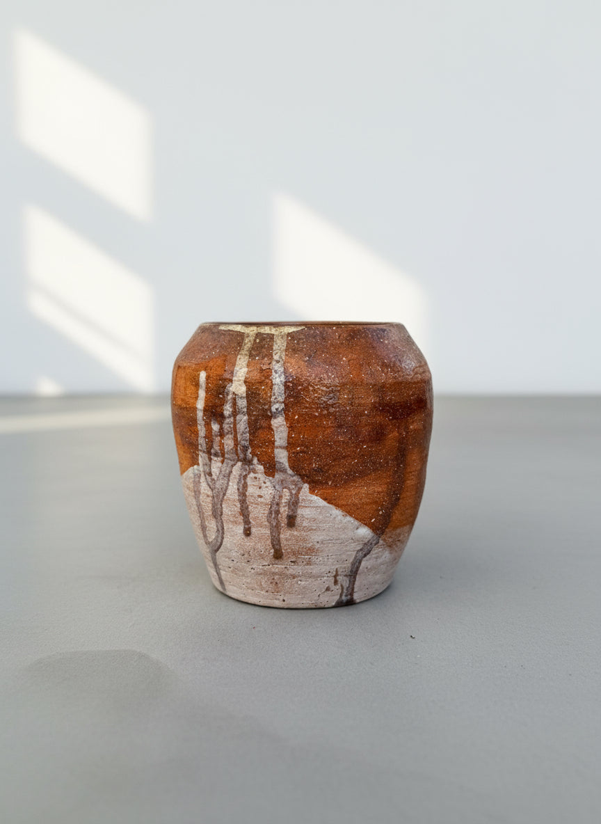Signed Buhrandt studio pottery cup with handcrafted stoneware form and abstract terracotta, cream, and charcoal glaze — Hommes and Gardens, Home Decor Collection, landscape design, plant design, Landscape Architect, Interior Designer, Outdoor Living, Outdoor Decorations, Home Design, Luxury Design, Art, Furniture, Objects, Best Gifts, Nature, Backyard, Yard.