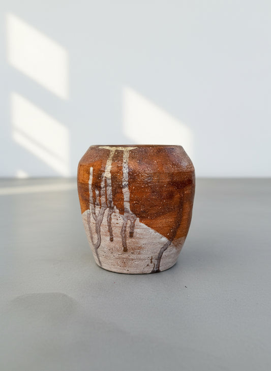 Signed Buhrandt studio pottery cup with handcrafted stoneware form and abstract terracotta, cream, and charcoal glaze — Hommes and Gardens, Home Decor Collection, landscape design, plant design, Landscape Architect, Interior Designer, Outdoor Living, Outdoor Decorations, Home Design, Luxury Design, Art, Furniture, Objects, Best Gifts, Nature, Backyard, Yard.
