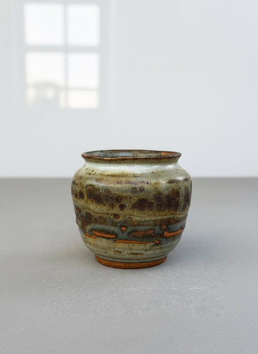 Hand-thrown studio pottery urn vase signed P.S.E. with layered brown, gray, and terracotta ash glaze, rounded stoneware form — Hommes and Gardens, Home Decor Collection, landscape design, plant design, Landscape Architect, Interior Designer, Outdoor Living, Outdoor Decorations, Home Design, Luxury Design, Art, Furniture, Objects, Best Gifts, Nature, Backyard, Yard.