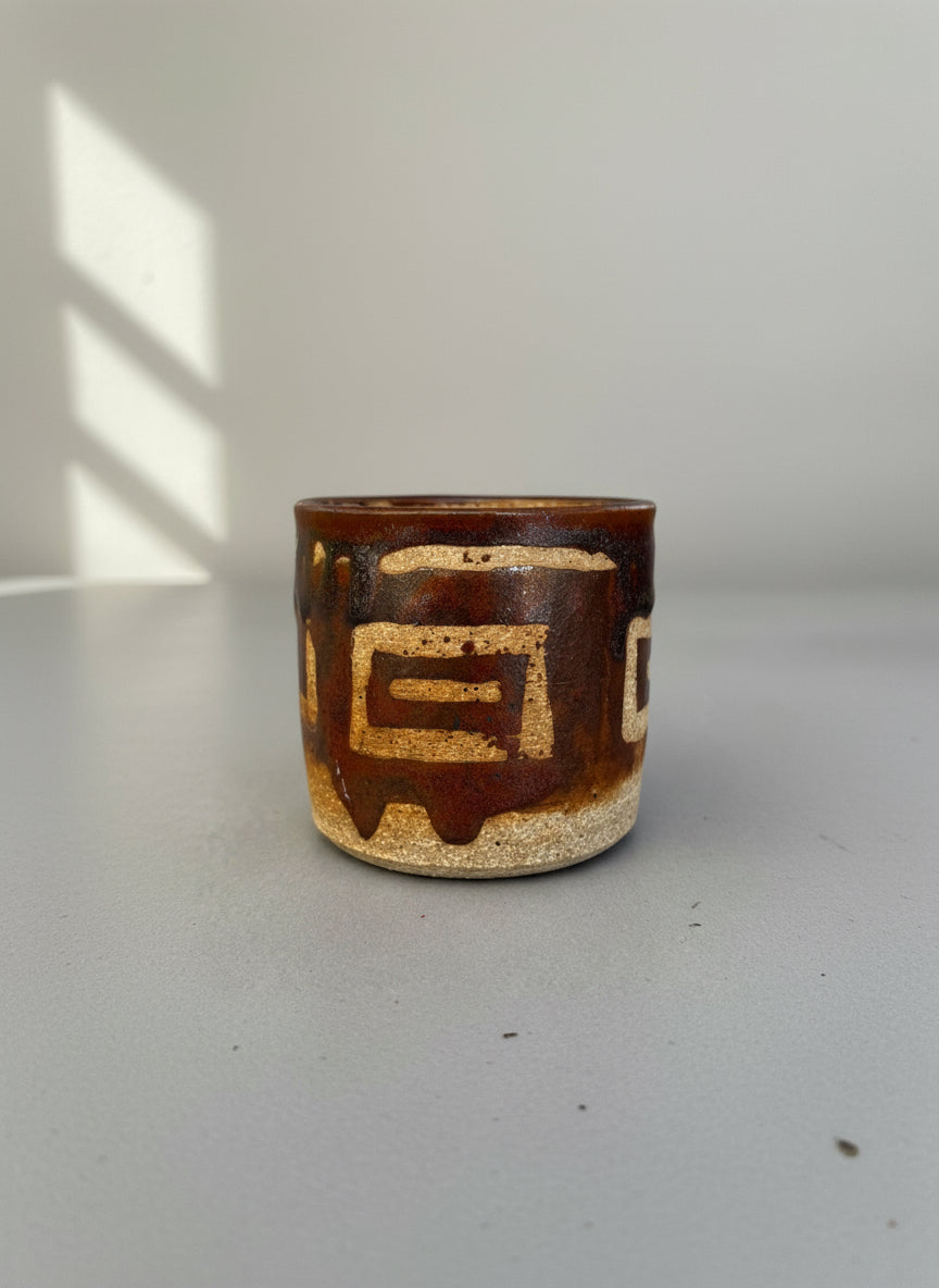 Side view of handmade mid-century modern studio pottery vessel with abstract brown and cream glaze on textured stoneware — Hommes and Gardens, Home Decor Collection, landscape design, plant design, Landscape Architect, Interior Designer, Outdoor Living, Outdoor Decorations, Home Design, Luxury Design, Art, Furniture, Objects, Best Gifts, Nature, Backyard, Yard.