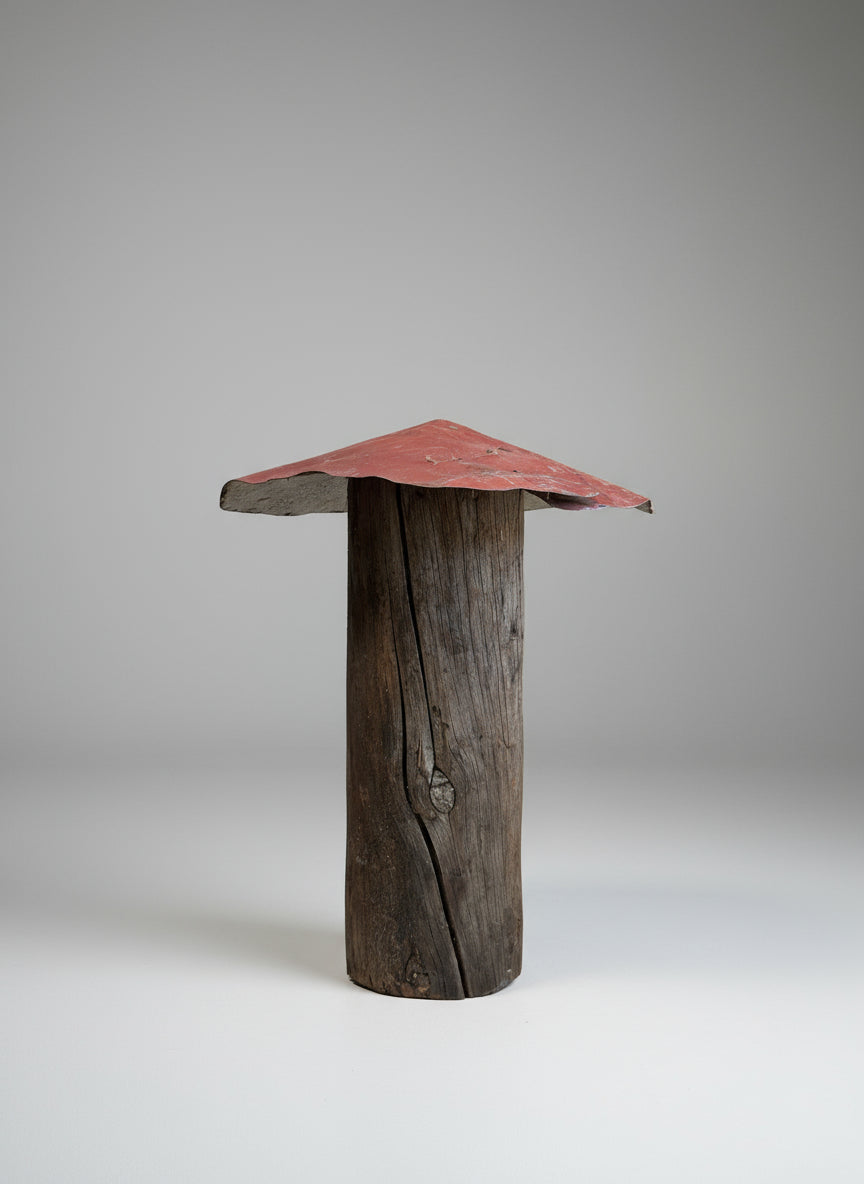 Tall mushroom sculpture made from a weathered wood post with a red metal roof, showcasing rustic primitive folk art craftsmanship and reclaimed materials — Hommes and Gardens, Home Decor Collection, landscape design, plant design, Landscape Architect, Interior Designer, Outdoor Living, Outdoor Decorations, Home Design, Luxury Design, Art, Furniture, Objects, Best Gifts, Nature, Backyard, Yard.