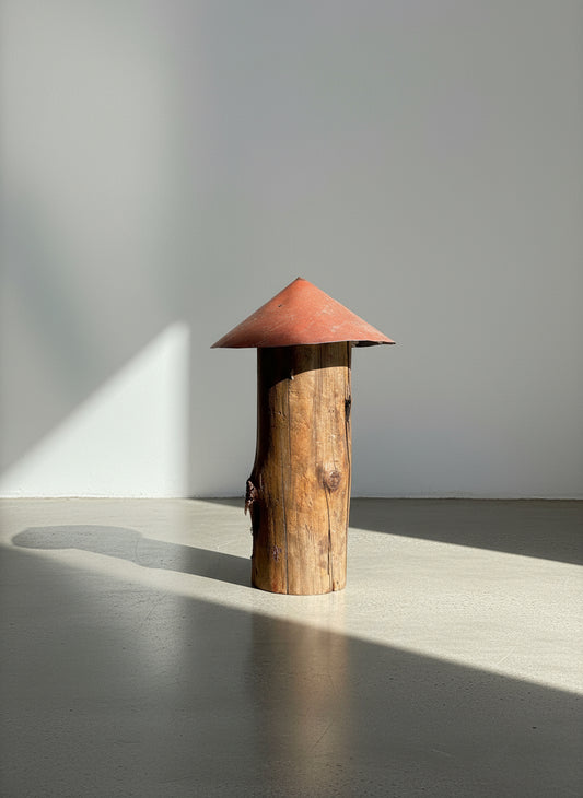 Tall red metal-roof mushroom sculpture handcrafted from weathered wood with visible knots and patina, featuring rustic primitive folk art design and reclaimed craftsmanship — Hommes and Gardens, Home Decor Collection, landscape design, plant design, Landscape Architect, Interior Designer, Outdoor Living, Outdoor Decorations, Home Design, Luxury Design, Art, Furniture, Objects, Best Gifts, Nature, Backyard, Yard.