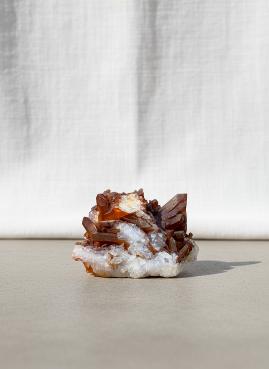 Tangerine quartz crystal specimen featuring natural orange hue from hematite inclusions, known for its energizing and healing properties — Hommes and Gardens, Pots + Vessels Collection, Home Decor, Decorative Minerals, Crystal Decor, Natural Stone, Collectible Specimen.