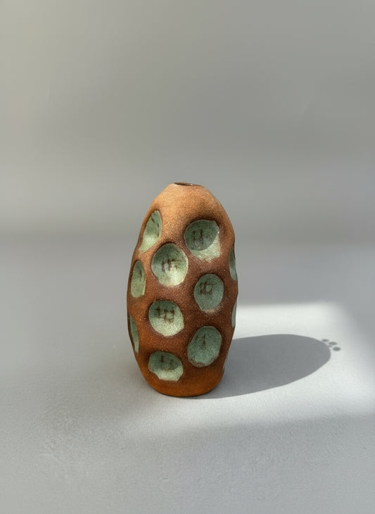 Handmade terracotta bud vase with celadon glazed circular impressions and organic textured form, modern studio pottery design — Hommes and Gardens, Home Decor Collection, landscape design, plant design, Landscape Architect, Interior Designer, Outdoor Living, Outdoor Decorations, Home Design, Luxury Design, Art, Furniture, Objects, Best Gifts, Nature, Backyard, Yard.