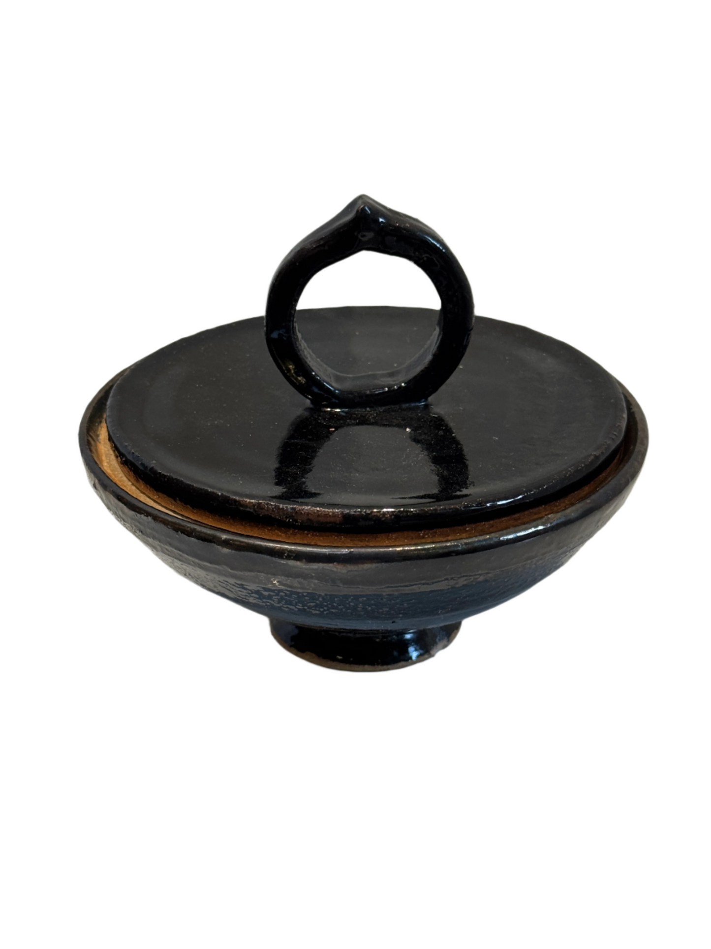 Vintage black glazed ceramic lidded bowl with sculptural ring handle and natural clay accents, a handcrafted decorative vessel blending rustic charm and elegance — Hommes and Gardens, Catchall Collection, Home Decor, Landscape Architect, Interior Designer, Outdoor Living, Outdoor Decorations, Home Design, Luxury Design, Art, Furniture, Objects, Best Gifts, Nature, Backyard, Yard.