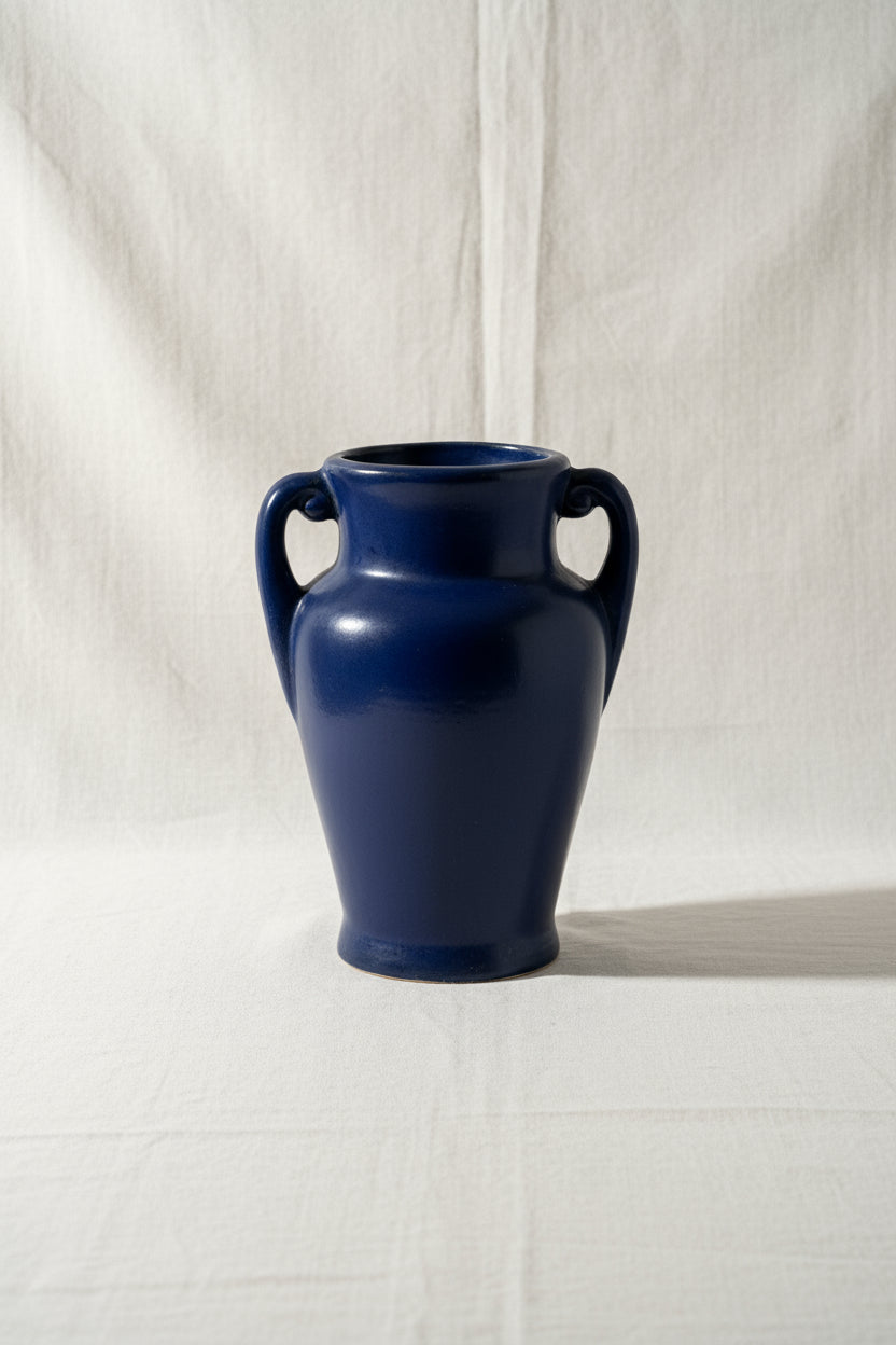 Vintage blue clay vase in classic urn style, handcrafted with rustic elegance and functional handles, perfect for floral or decorative use — Hommes and Gardens, Pots + Vessels Collection, Vases, Vintage Pottery, Handmade Decor, Rustic Home Accessories, Classic Clay Art, Timeless Interior Accent.
