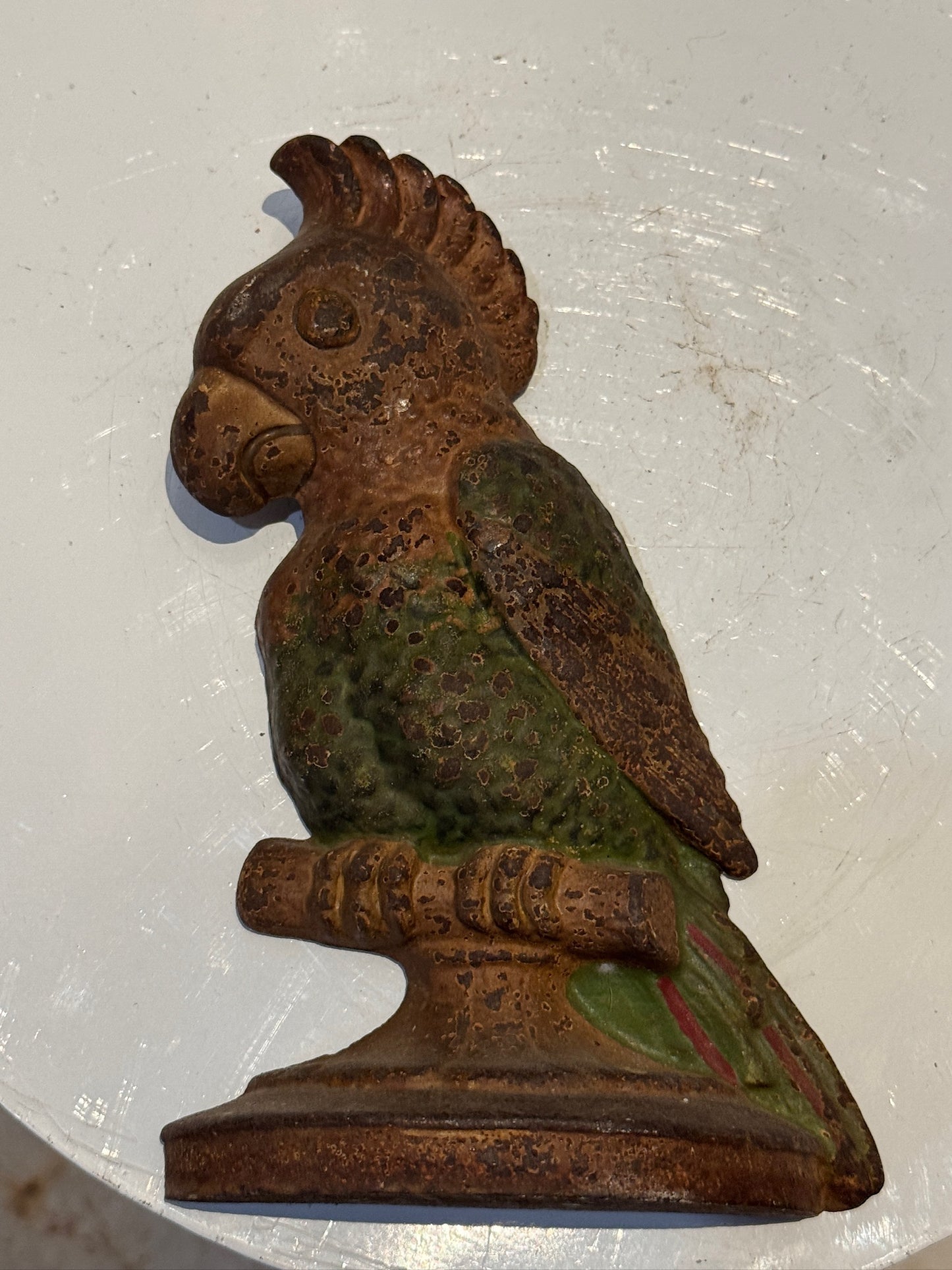 Vintage cast iron parrot doorstop by Hubley with original hand-painted finish, intricate detailing and early 20th-century authenticity — Hommes and Gardens, Landscape Architect, Interior Designer, Outdoor Living, Art, Furniture, Objects, Best Gifts, Nature, Backyard, Yard, Outdoor Decorations, Home Decor, Home Design, Luxury Design.