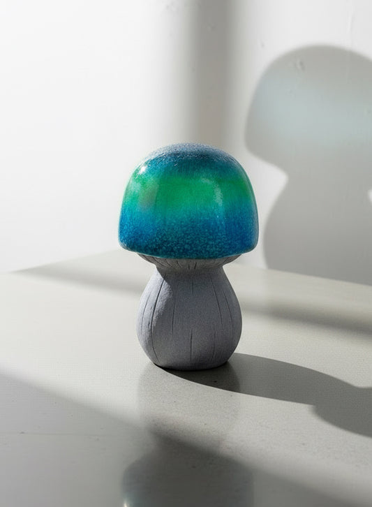 Vintage ceramic garden mushroom sculpture with vibrant green and blue glaze, a bold psychedelic art piece perfect for outdoor or indoor decor — Hommes and Gardens, Home Decor Collection, Sculptures & Statues, Garden Decor, Vintage Pottery, Ceramic Art, Whimsical Design, Handmade Garden Ornament.