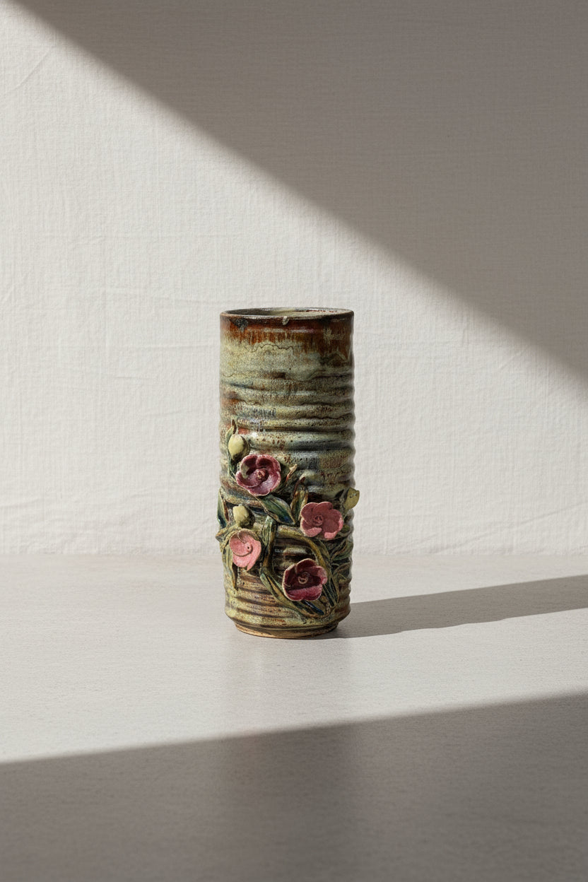 Vintage ceramic glazed vase featuring intricate flower motif detailing and a handcrafted artisan finish, perfect as a decorative accent or floral display — Hommes and Gardens, Pots and Vessels Collection, Objects, Home Decor, Vases, handmade pottery, floral ceramic art, vintage-inspired design, collectible decor, interior styling, artisan craftsmanship.