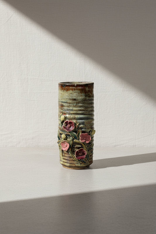 Vintage ceramic glazed vase featuring intricate flower motif detailing and a handcrafted artisan finish, perfect as a decorative accent or floral display — Hommes and Gardens, Pots and Vessels Collection, Objects, Home Decor, Vases, handmade pottery, floral ceramic art, vintage-inspired design, collectible decor, interior styling, artisan craftsmanship.