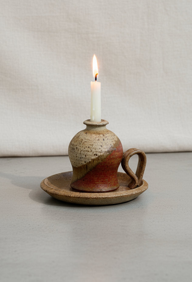 Vintage chamber stick candle holder crafted in glazed brown and beige stoneware, a timeless ceramic piece adding rustic warmth to any space — Hommes and Gardens, Home Decor Collection, Candles, Candle Holders, Vintage Pottery, Ceramic Decor, Rustic Home Accessories, Handmade Lighting Accent.