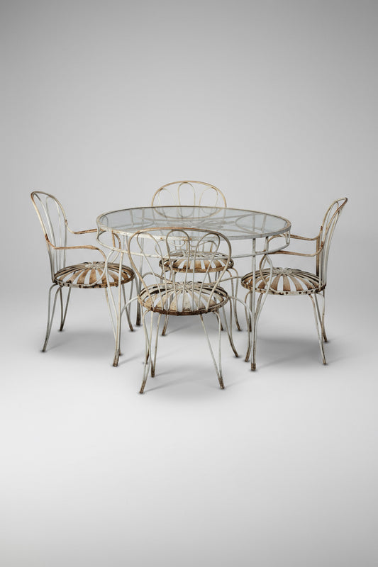 Vintage François Carré garden chairs and table set in classic French wrought iron design, showcasing early 20th-century craftsmanship and timeless outdoor elegance — Hommes and Gardens, Furniture Collection, Outdoor Furniture Sets, Vintage French Design, Wrought Iron Seating, Garden Decor, Patio Furniture, Collectible Outdoor Set.