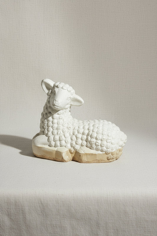 Vintage laying lamb stoneware figurine crafted with fine detail, capturing the peaceful essence of a resting lamb — Hommes and Gardens, Home Decor Collection, Figurines, Stoneware Sculptures, Rustic Decor, Farmhouse Style, Handmade Ceramic Art, Vintage Home Accessories.