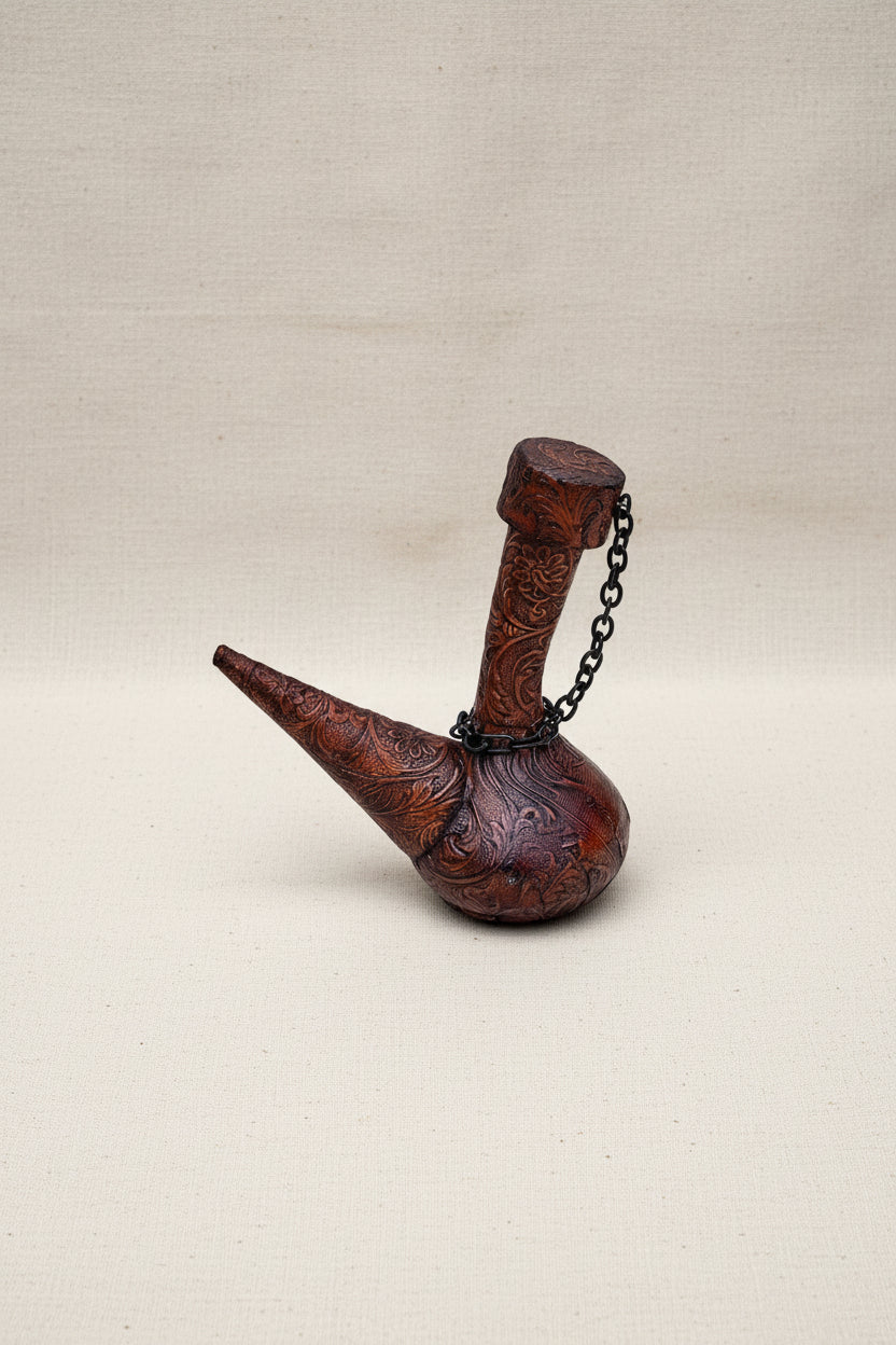 Vintage leather-covered wine decanter featuring genuine leather wrap and elegant craftsmanship, perfect for bar or dining decor — Hommes and Gardens, Home Decor Collection, Decanters, Vintage Barware, Leather Accessories, Wine Serving, Luxury Home Decor, Gift for Wine Lovers.