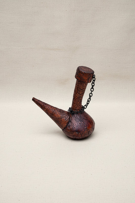 Vintage leather-covered wine decanter featuring genuine leather wrap and elegant craftsmanship, perfect for bar or dining decor — Hommes and Gardens, Home Decor Collection, Decanters, Vintage Barware, Leather Accessories, Wine Serving, Luxury Home Decor, Gift for Wine Lovers.