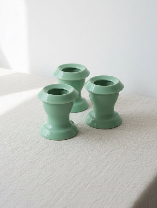 Set of three vintage teal jadeite egg cups with glossy mid-century finish, combining retro charm and functional elegance for timeless table styling — Hommes and Gardens, Home Decor Collection, Bowls, Decorative Objects, Vintage Tableware, Mid Century Design, Jadeite Glass, Retro Kitchen Decor, Collectible Dining Accessories.