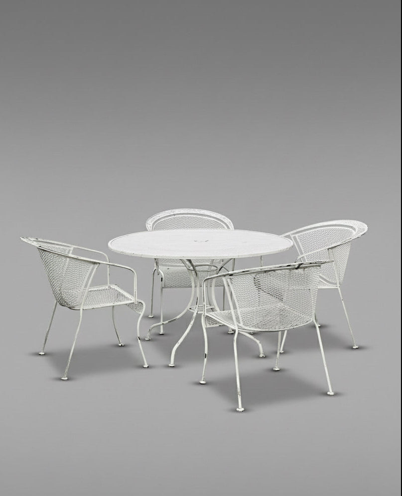 Vintage Woodard wrought iron patio set featuring Briarwood “Daisy Barrel” design with table and chairs, elegant mid-century outdoor furniture with white patina finish — Hommes and Gardens, Furniture Collection, Outdoor Furniture Sets, Patio Decor, Mid Century Modern, Wrought Iron Design, Vintage Outdoor Seating, Garden Furniture, Architectural Patio Accent.