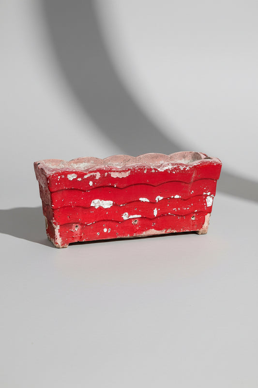 Willy Guhl vintage red planter from 1960s Switzerland, crafted in concrete with aged patina and bold mid-century modern design — Hommes and Gardens, Pots and Vessels Collection, Planters, Designer Decor, Mid Century Style, Vintage Concrete Planter, Swiss Design, Outdoor Living, Collectible Home Accent, Architectural Garden Decor.