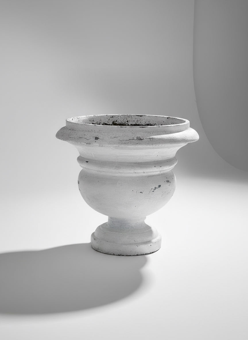 Vintage Willy Guhl white urn with distinctive weathered patina, an oversized 21-inch planter showcasing Swiss mid-century design and timeless craftsmanship — Hommes and Gardens, Pots and Vessels Collection, Planters, Garden Decor, Designer Concrete, Mid Century Modern, Vintage Swiss Design, Architectural Accent, Outdoor Living, Collectible Home Decor.