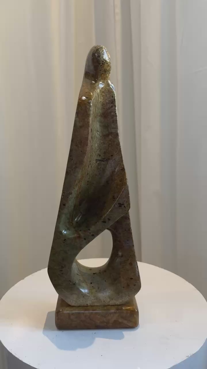 Abstract figurative soapstone sculpture by Marco Lyra, elegant mid-century design with fluid form and smooth soapstone texture — Hommes and Gardens, Objects Collection, Landscape Architect, Interior Designer, Outdoor Living, Art, Furniture, Objects, Best Gifts, Nature, Backyard, Yard, Outdoor Decorations, Home Decor, Home Design, Luxury Design.